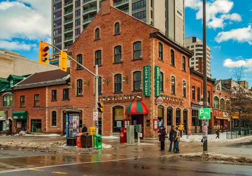 ByWard Market (sometimes called By Ward Market, Byward Market or simply The Market, Marché By in French) is a district in Lower Town (Ottawa, Ontario) located east of the government and business district, surrounding the market buildings and open-air market on George, York, ByWard and William Streets. https://en.wikipedia.org/wiki/ByWard_Market